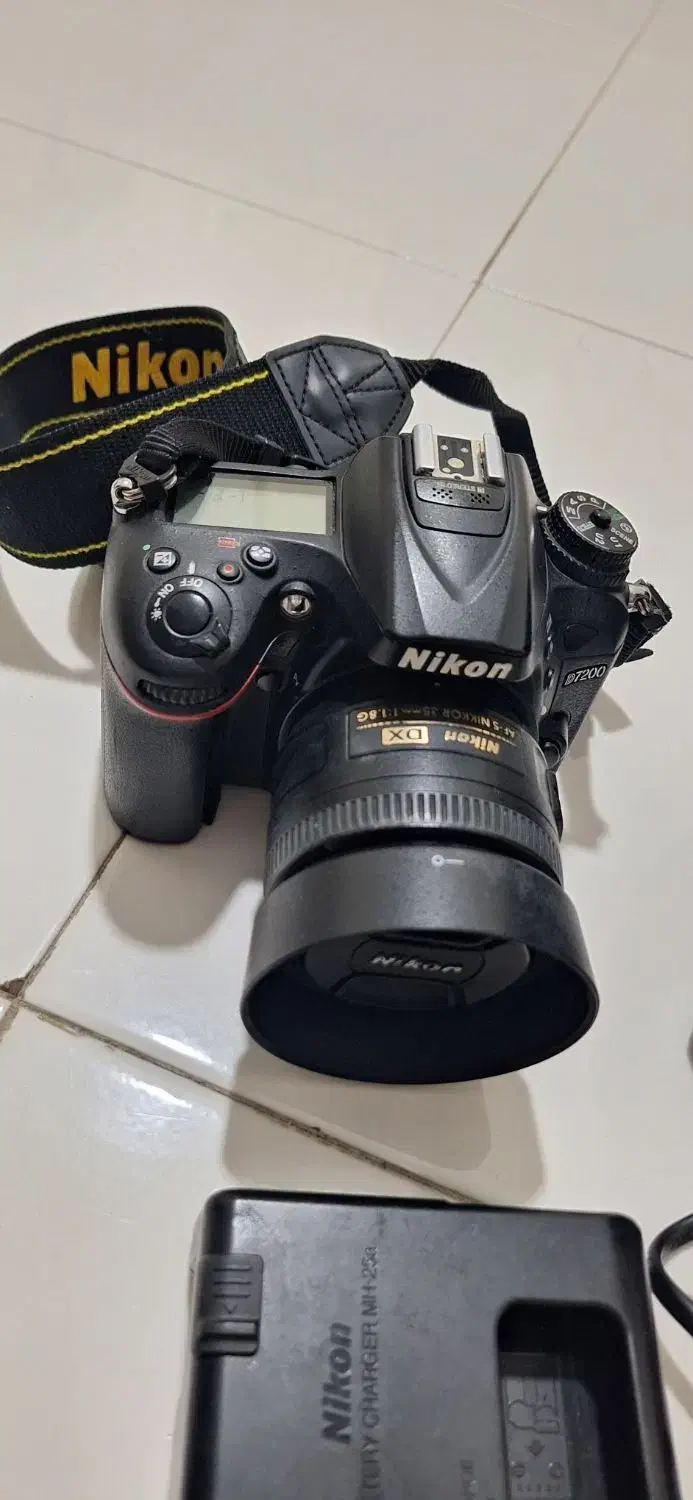 نیکون d7200 با لنز نیکور 35mm / f1/8|دوربین عکاسی و فیلم‌برداری|تهران, فلسطین (میدان انقلاب)|دیوار