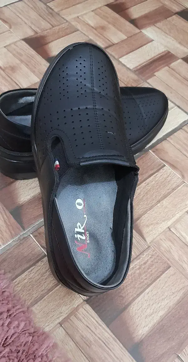 کفش طبی|کیف، کفش، کمربند|رشت, فلسطین|دیوار