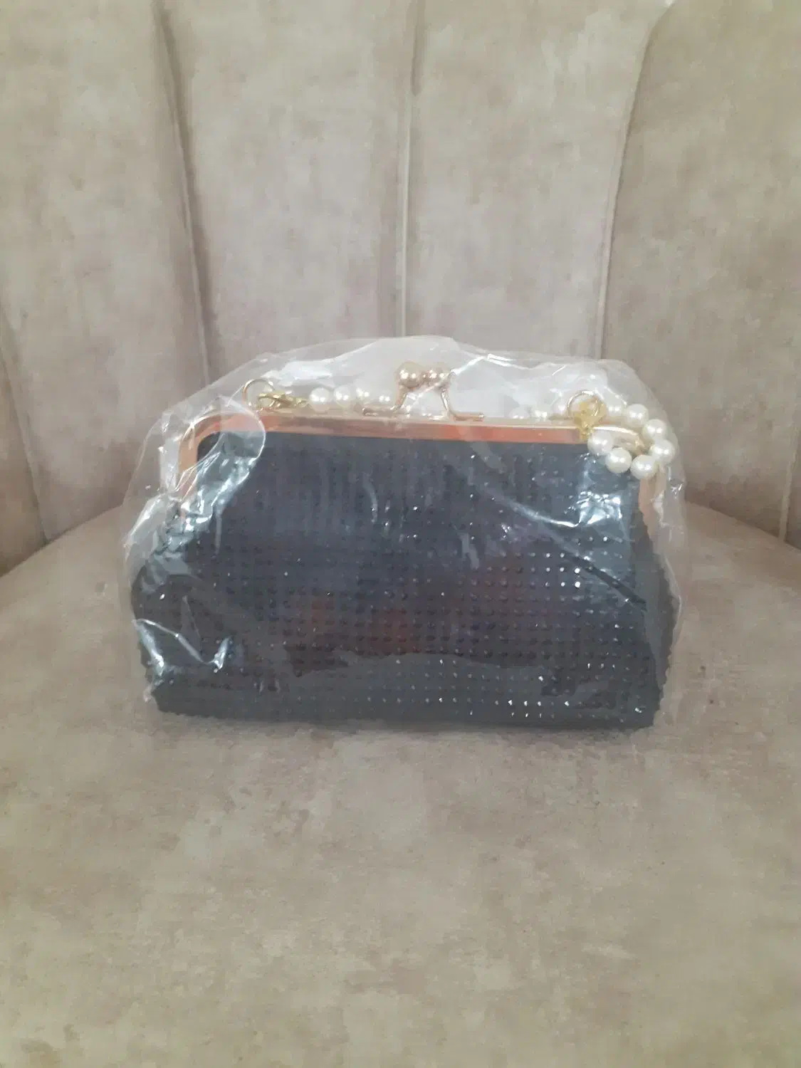 کیف نو|کیف، کفش، کمربند|قم, قلعه عموحسین|دیوار