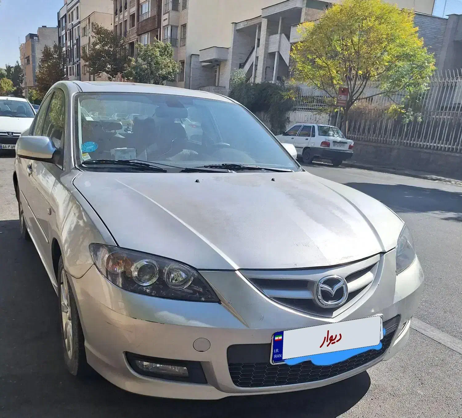فروش مزدا ۳ نقره ای تیپ سه فول|خودرو سواری و وانت|شیراز, چنچنه|دیوار