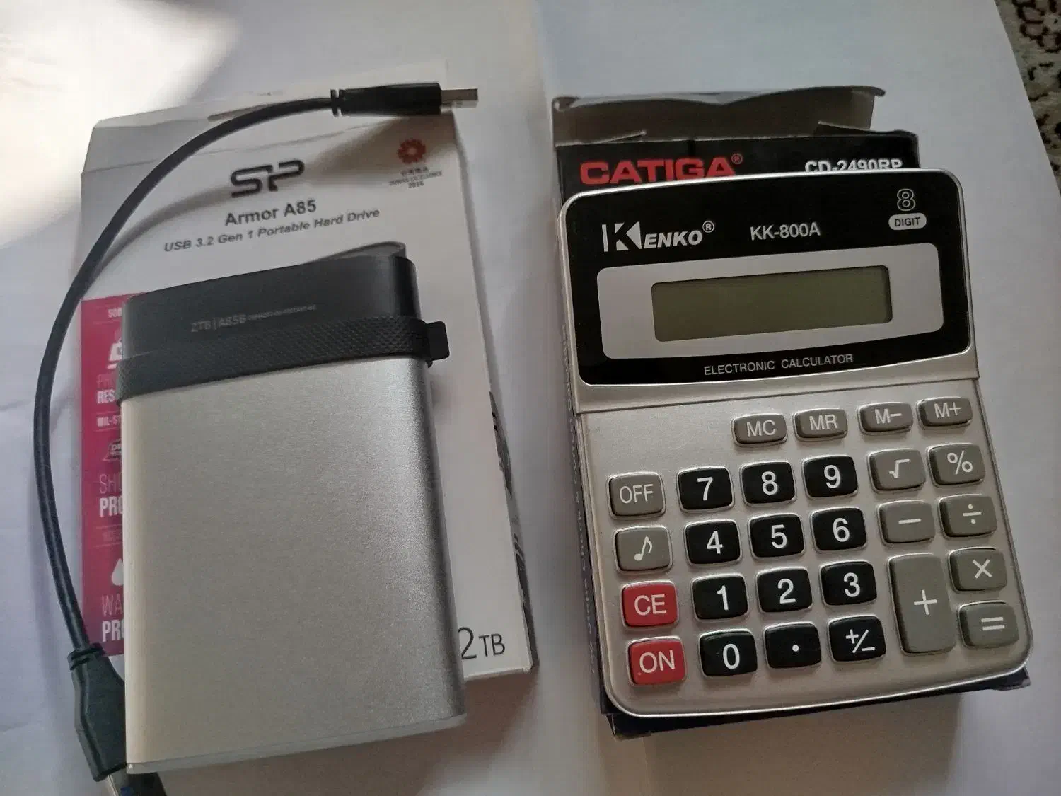 هارد اکسترنال SP ARMOR A85 و ماشین حساب CATIGA|قطعات و لوازم جانبی رایانه|شیراز, فرگاز|دیوار
