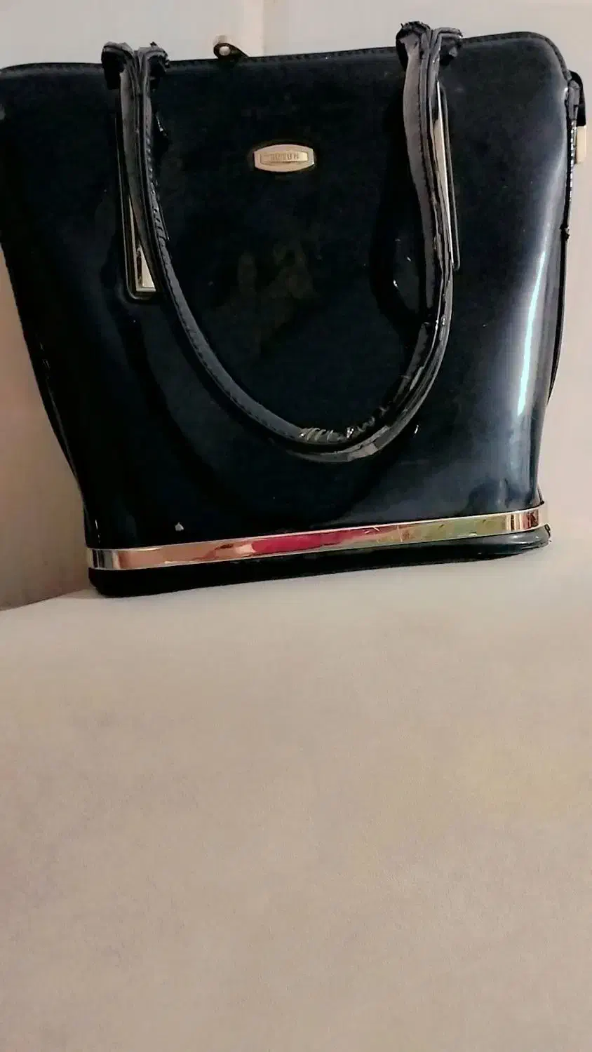 کیف|کیف، کفش، کمربند|بندر گناوه, |دیوار