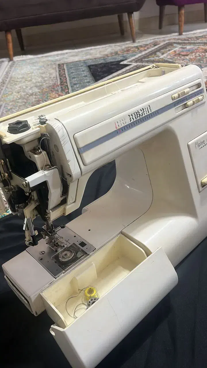 چرخ خیاطی ژانومه|چرخ خیاطی و ریسندگی|قدس, شهر‌قدس|دیوار