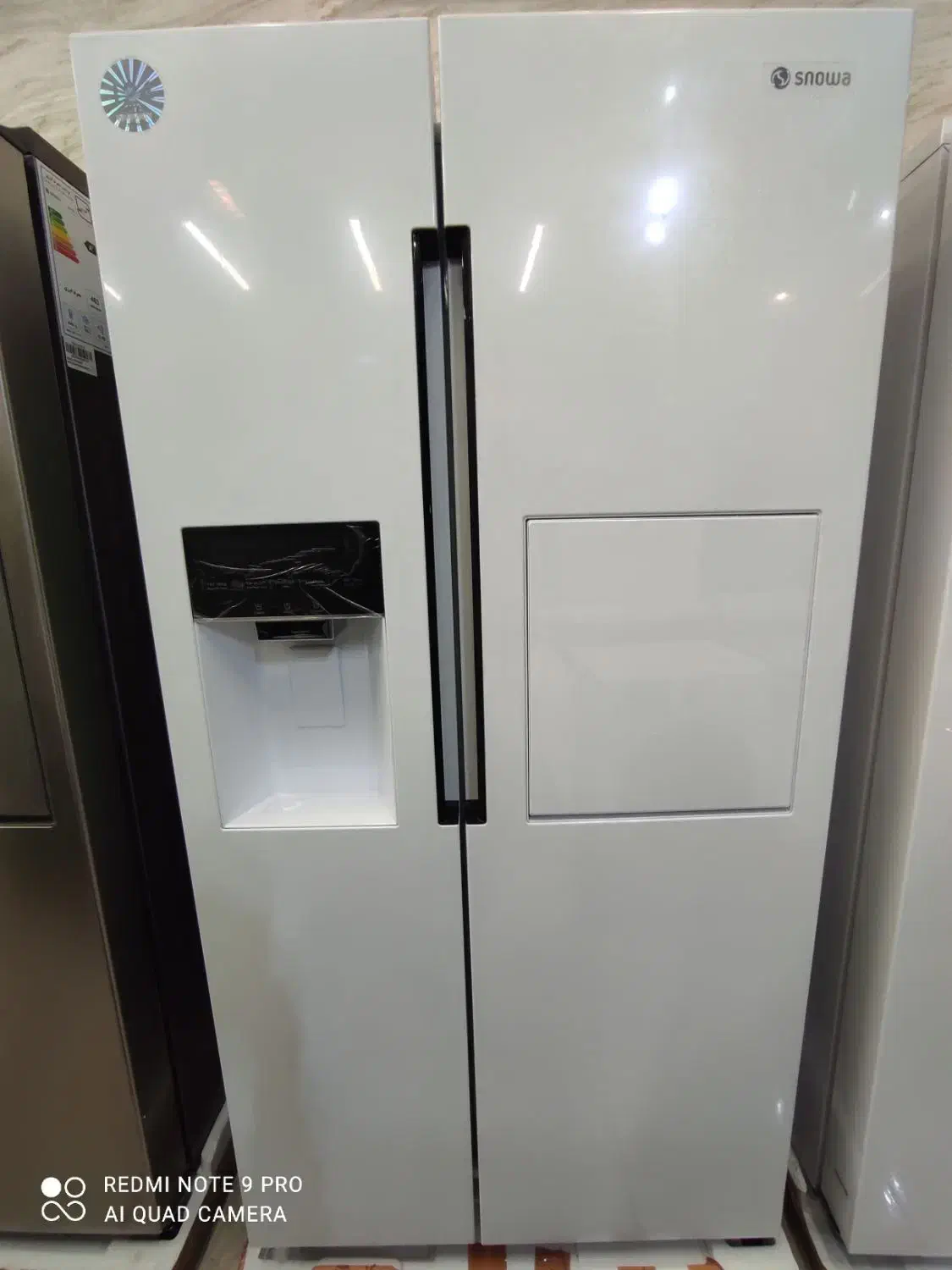 ساید اسنوا ۳۲ فوت با میز بار زیر قیمت در مشهد کالا|یخچال و فریزر|مشهد, ولیعصر (شهرک غرب)|دیوار