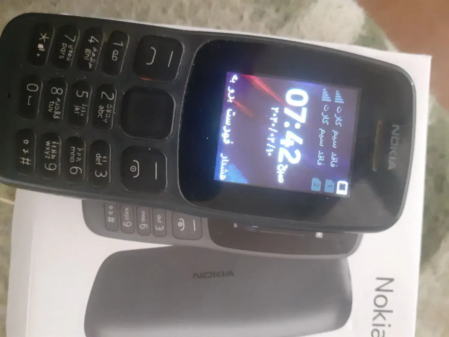 گوشی نوکیا۱۰۶|موبایل|میانه, |دیوار