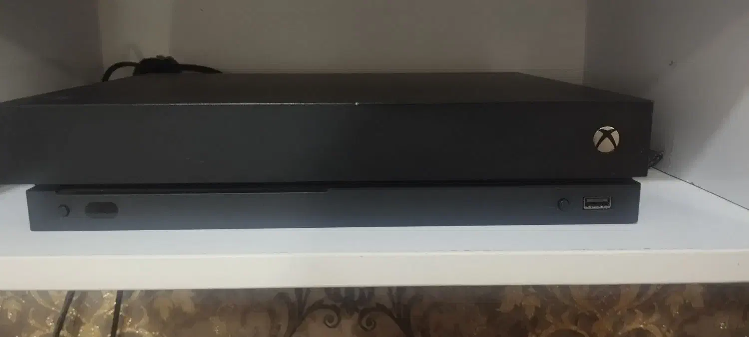 کنسول ایکس باکس وان ایکس|کنسول، بازی ویدئویی و آنلاین|میانه, |دیوار