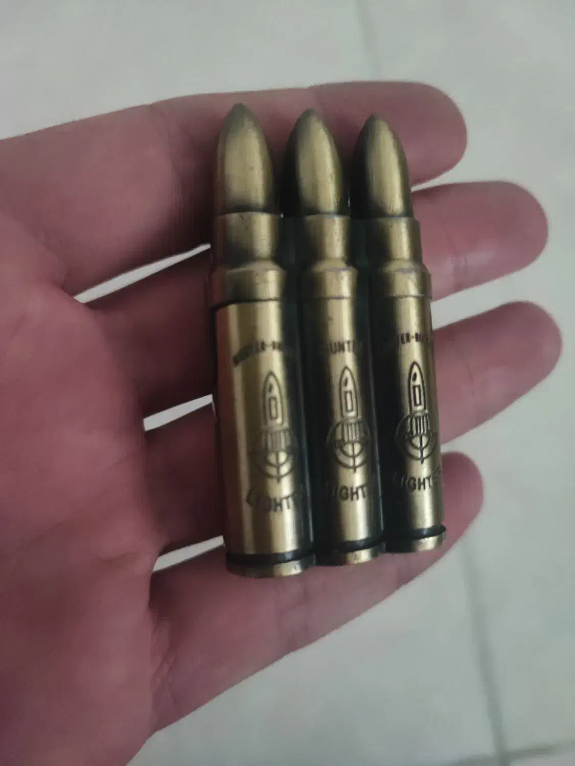 فندک طرح فشنگ|کلکسیون اشیاء عتیقه|کرمانشاه, |دیوار