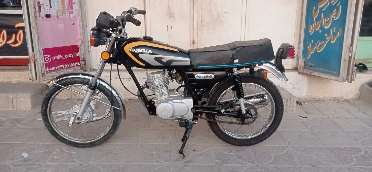 موتور 125|موتورسیکلت|آبپخش, |دیوار