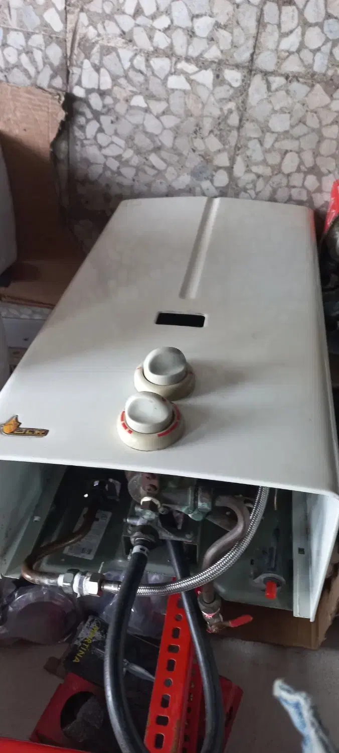 تعمیرات آبگرمکن. پمپ آب .پکیچ|خدمات پیشه و مهارت|رشت, استقامت ۱|دیوار