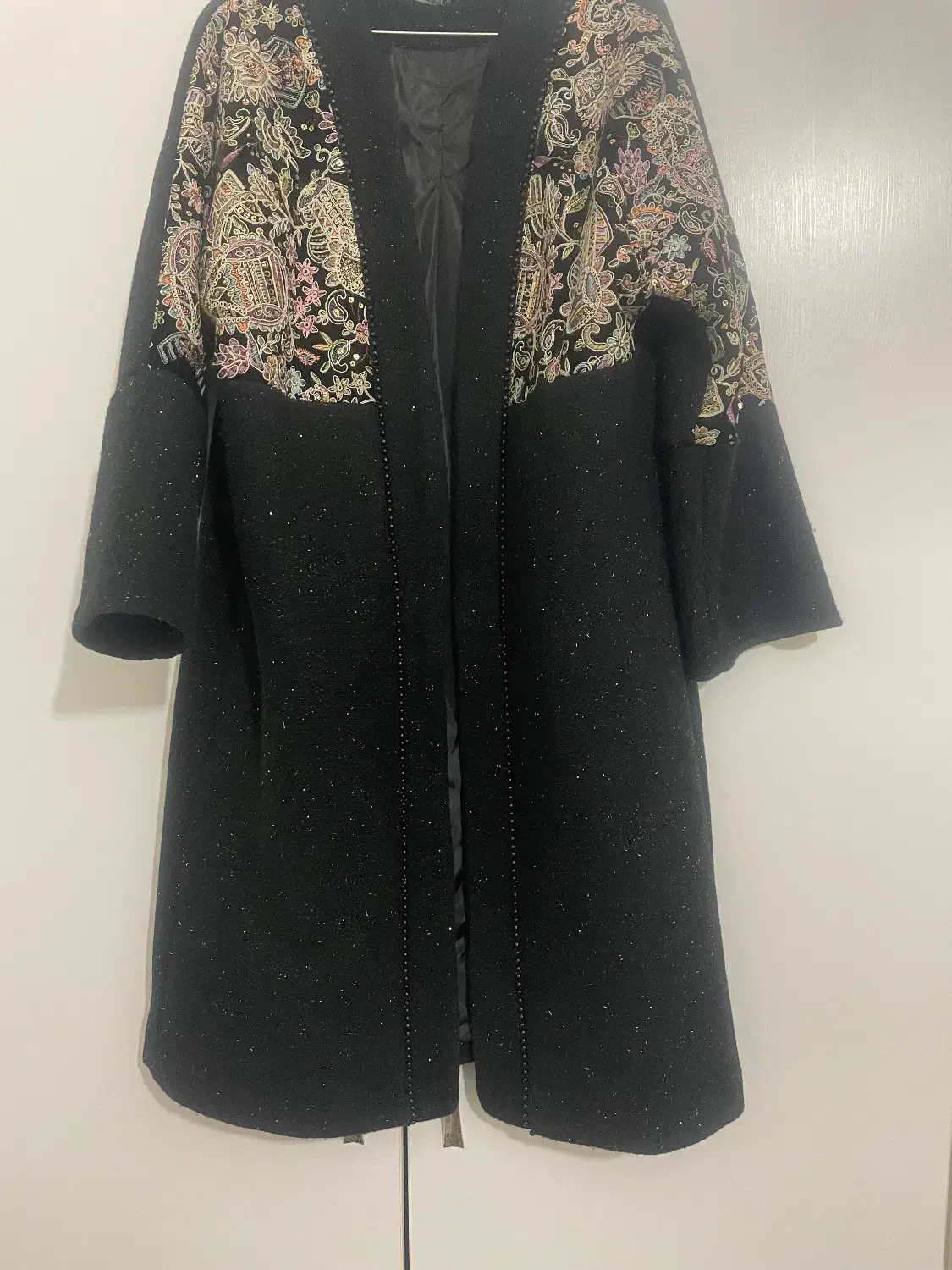 پالتو|لباس|کرمانشاه, |دیوار