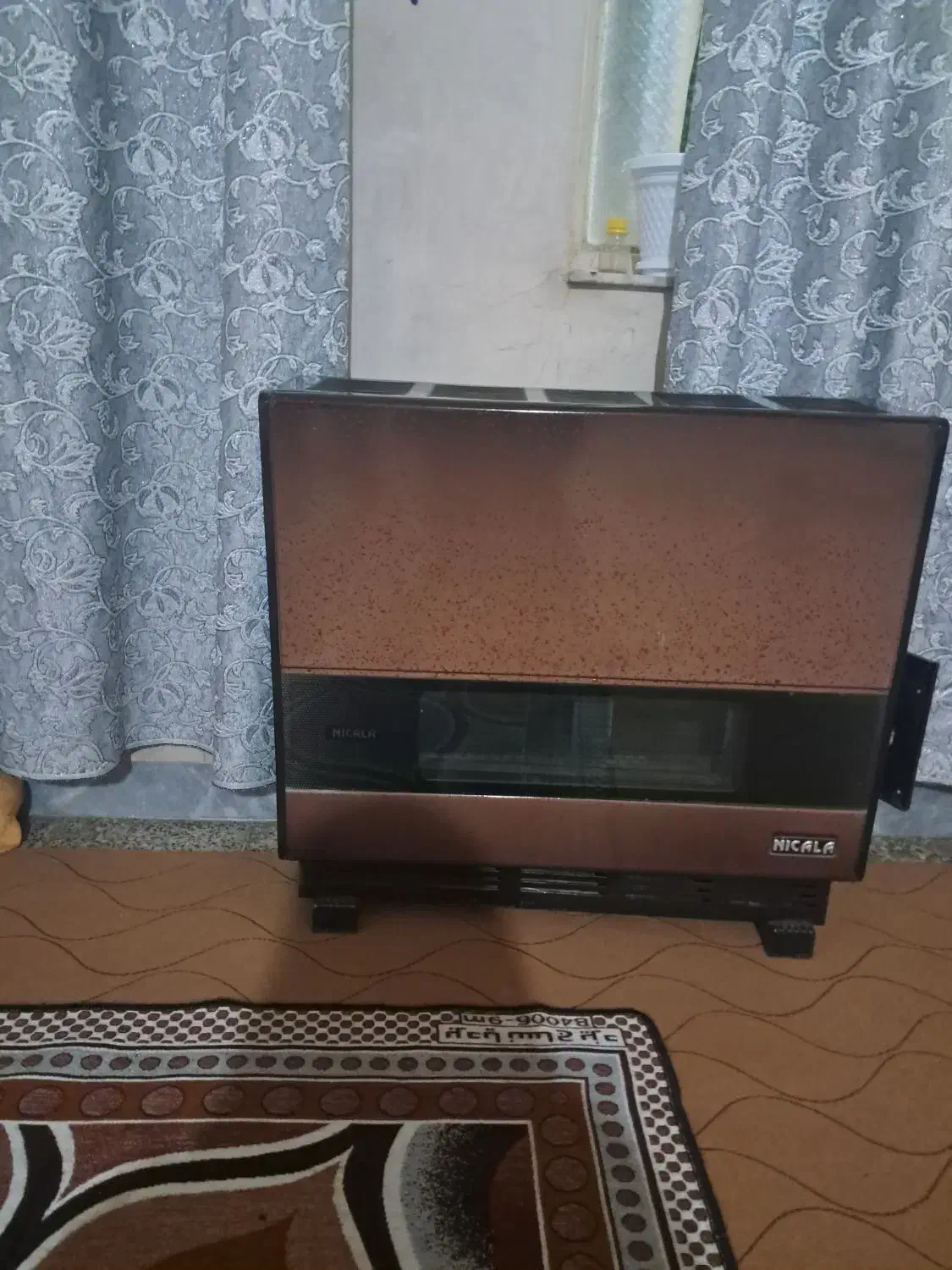 بخاری مارک نیک کالا|بخاری، هیتر، شومینه|ایذه, |دیوار