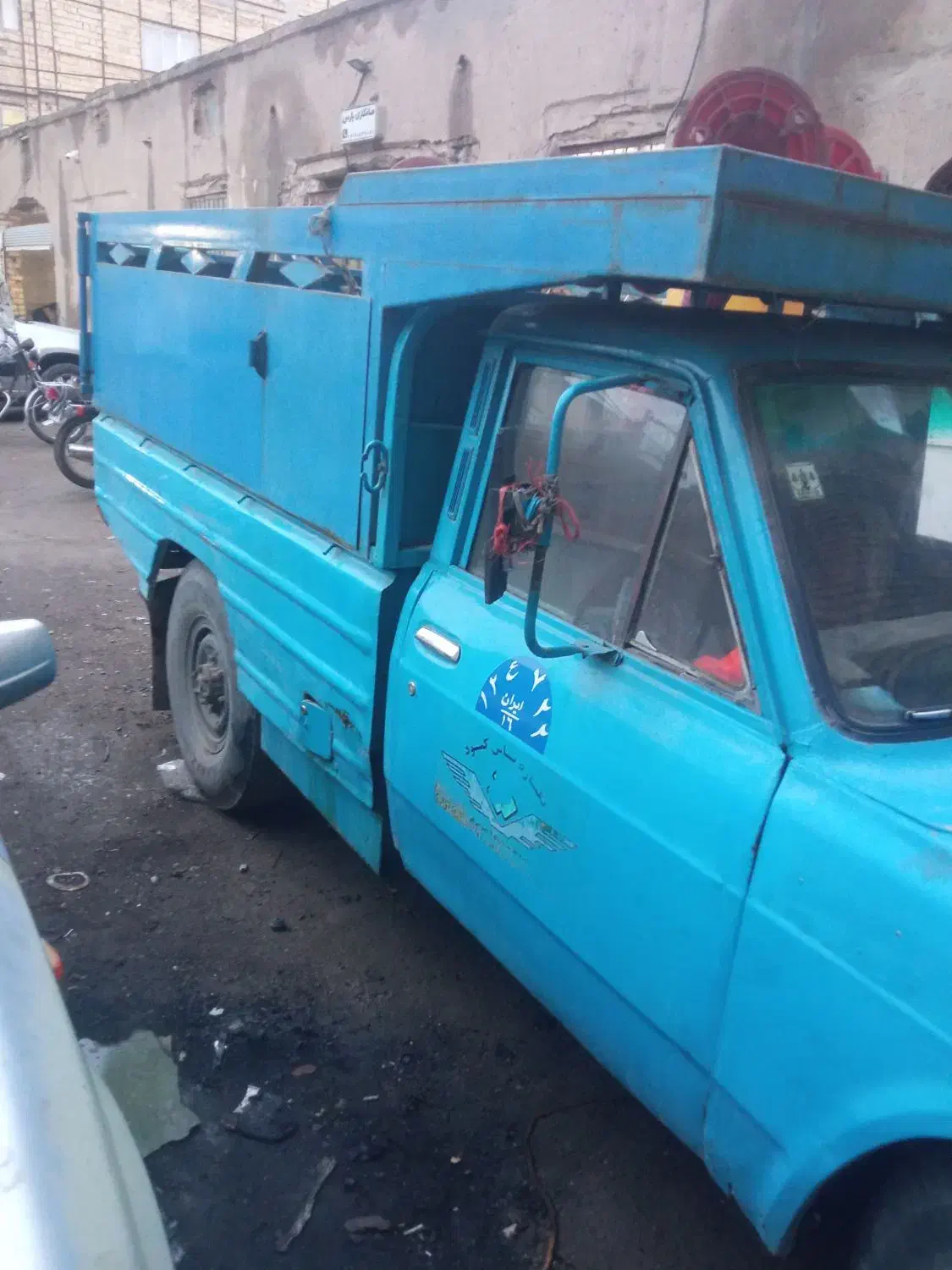 نیسان|خودرو سواری و وانت|قم, دروازه چوبی|دیوار