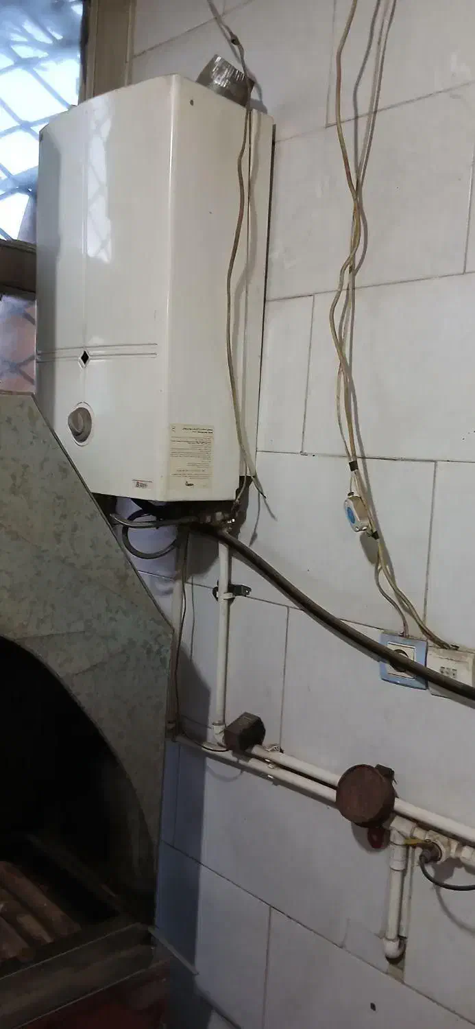 آبگرمکن بوتان|آبگرمکن، پکیج، شوفاژ|زرندیه, |دیوار