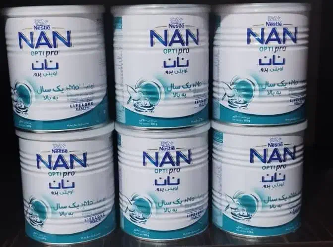 تعدادی قوطی شیر خشک|ظروف نگهدارنده، پلاستیکی، یک‌بارمصرف|برازجان, |دیوار