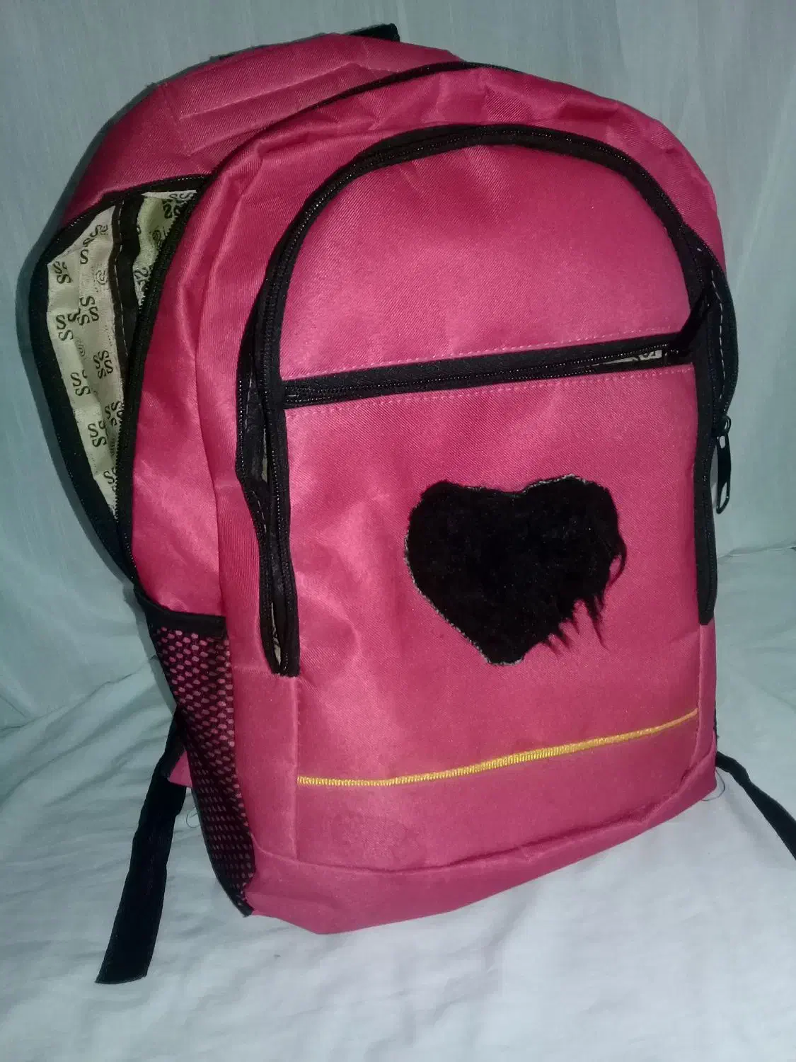 کوله مدرسه نو|کیف، کفش، کمربند|قم, هفت تیر|دیوار