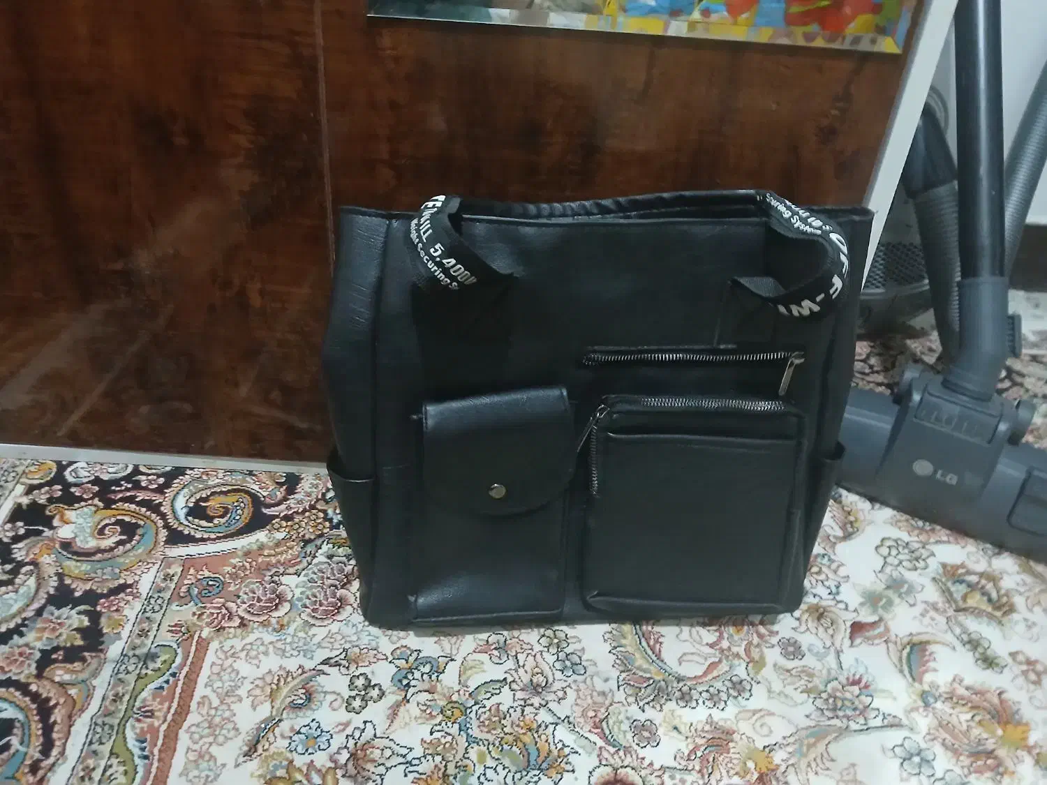 کیف|کیف، کفش، کمربند|نهاوند, |دیوار