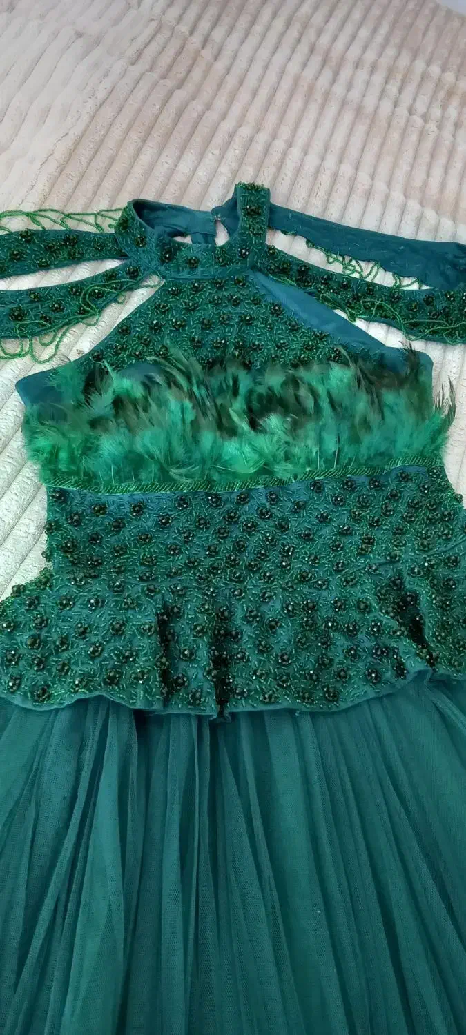 لباس مجلسی|لباس|مشهد, شهید آوینی|دیوار