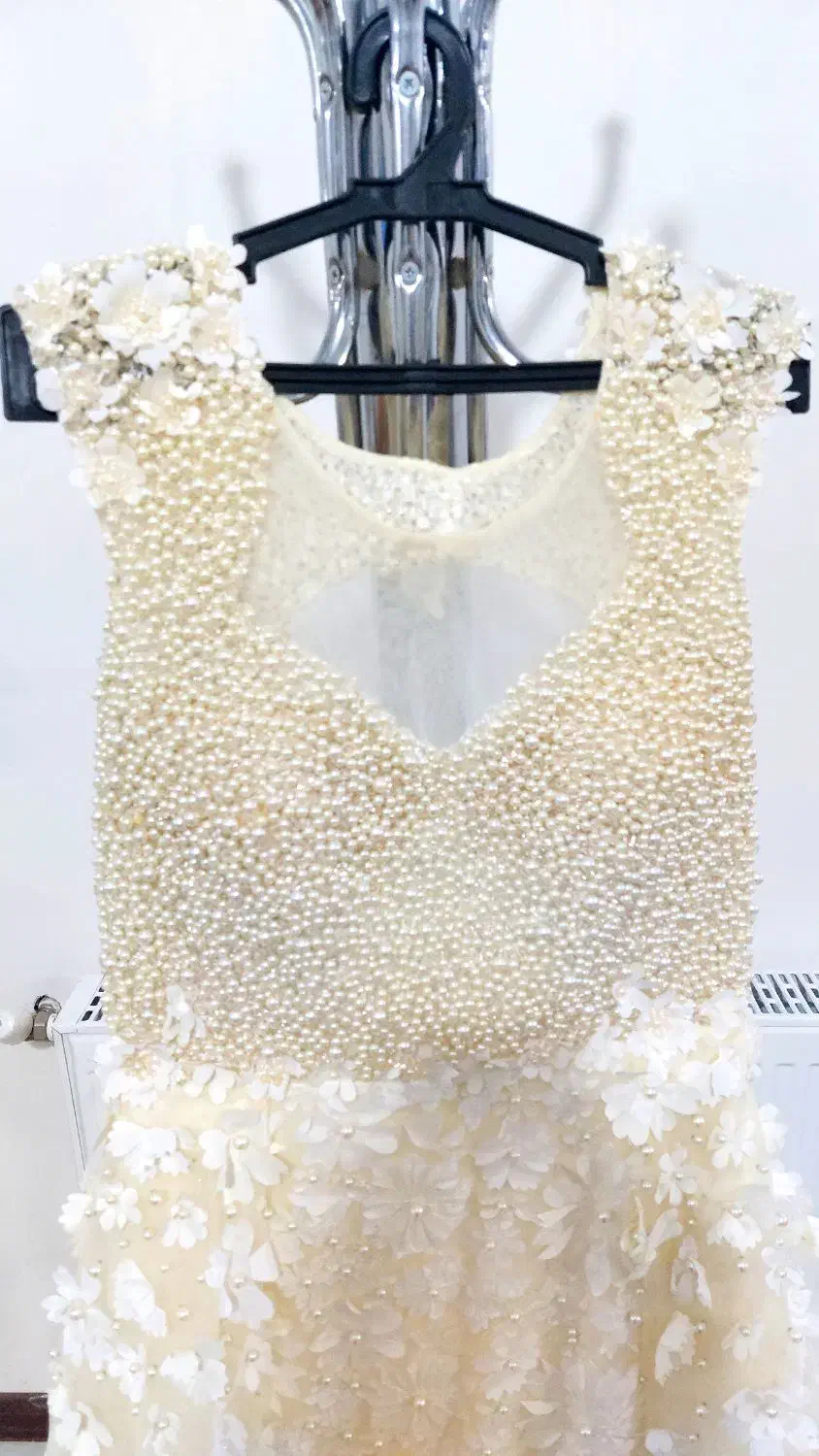 لباس مجلسی|لباس|مشهد, حرم مطهر رضوی|دیوار