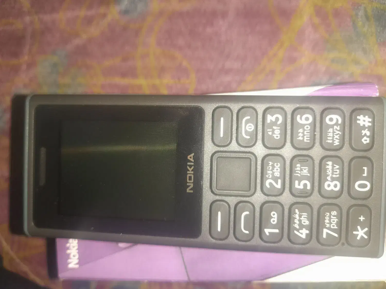 نوکیا ۱۰۵|موبایل|آبپخش, |دیوار