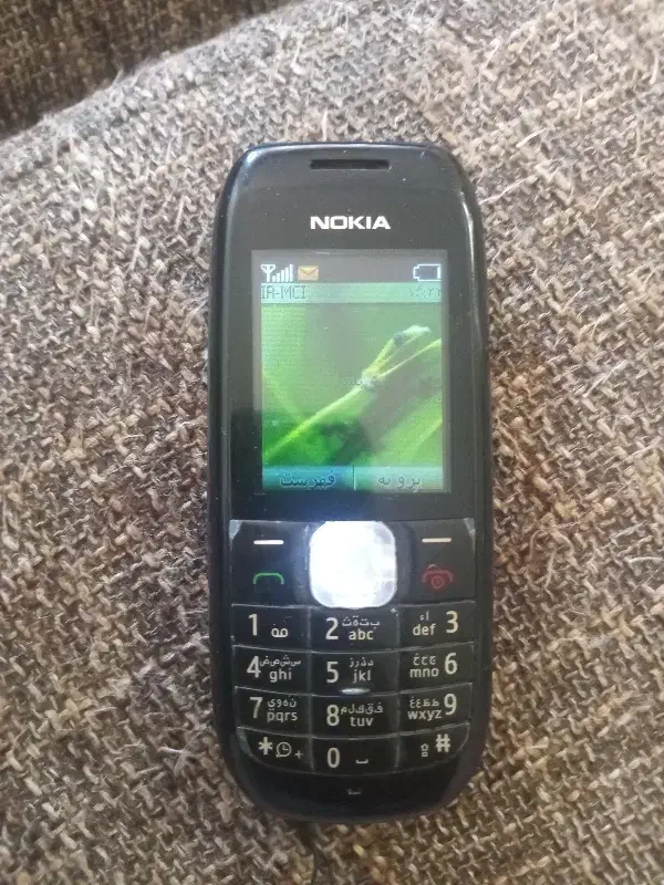 نوکیا 1616|موبایل|پرند, فاز ۵|دیوار