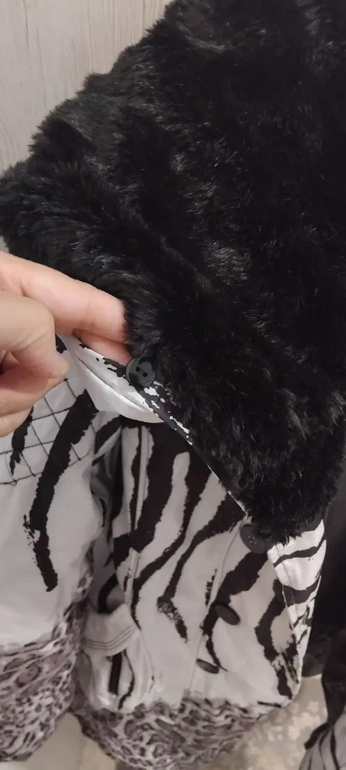 پالتو|لباس|رباط‌کریم, نصیرشهر|دیوار