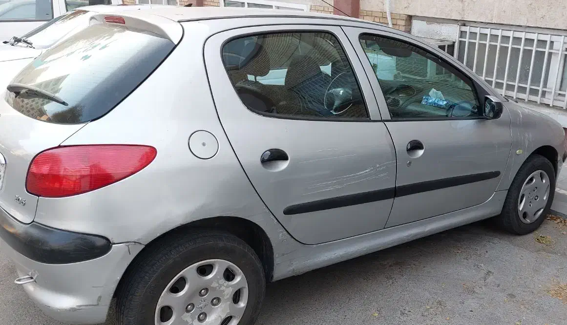 پژو ۲۰۶ نقره ای مدل ۸۳ تیپ ۲|خودرو سواری و وانت|تهران, باغ خزانه|دیوار