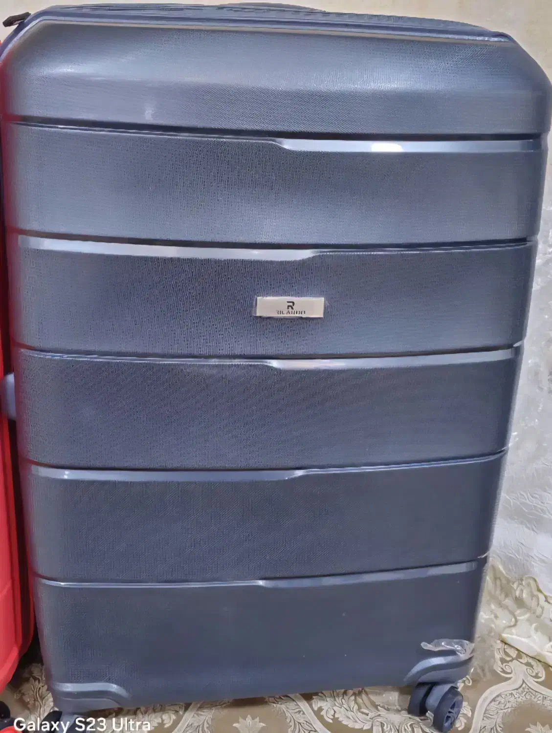 چمدان|کیف، کفش، کمربند|دوگنبدان, |دیوار