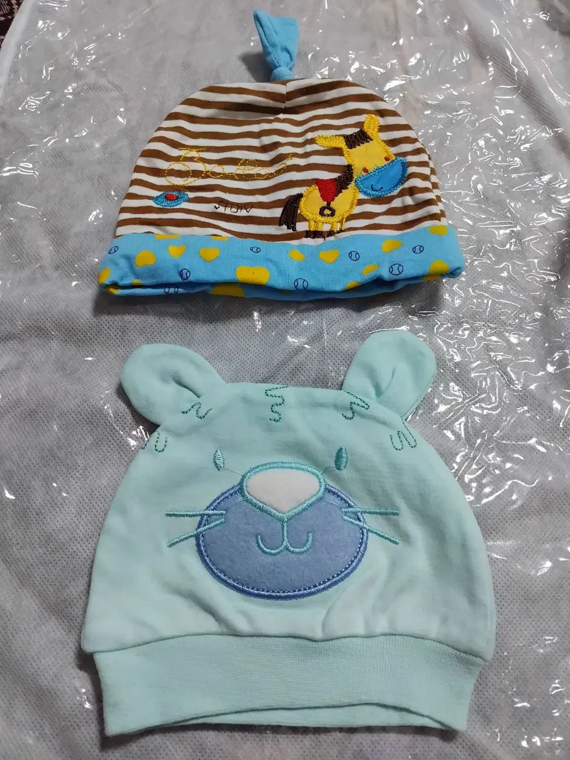 قنداق نوزادودوعدد کلاه نو|اسباب و اثاث بچه|اردبیل, |دیوار