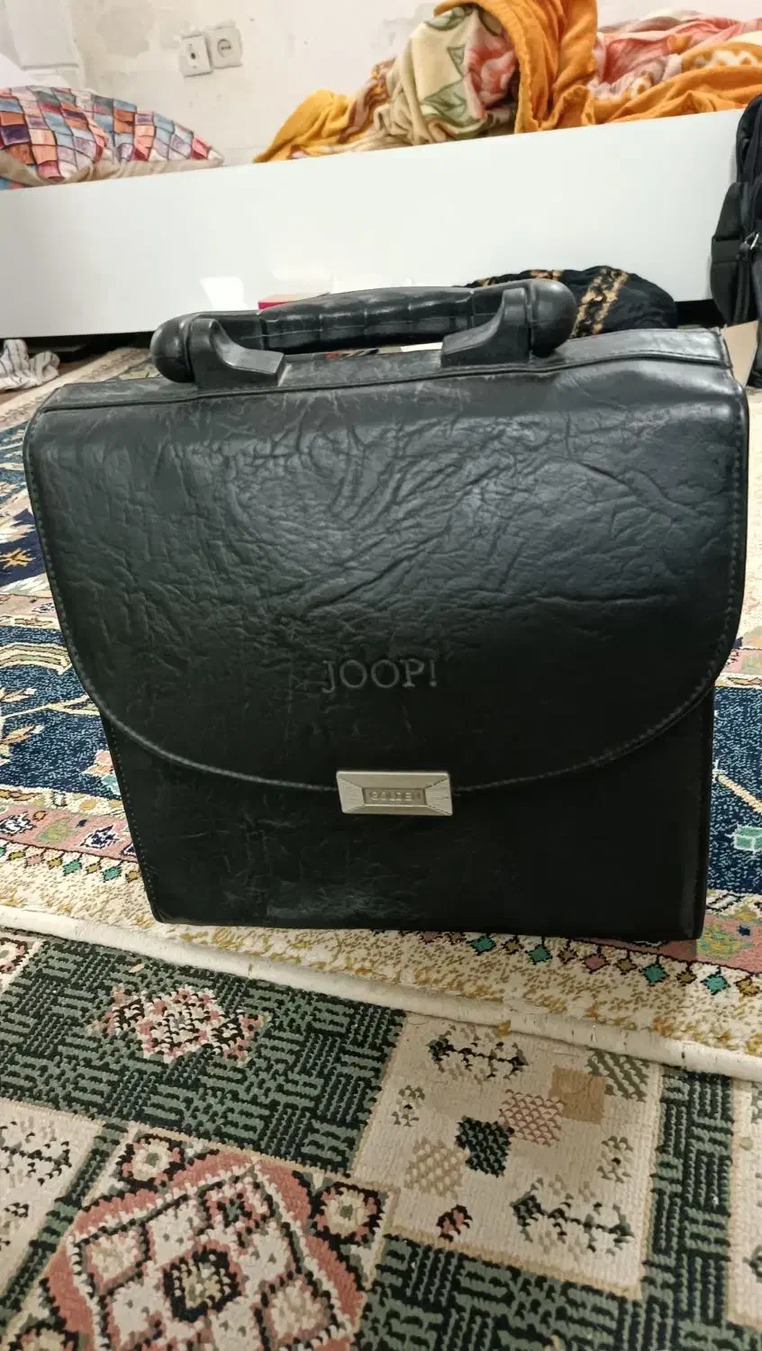 کیف چرمی با قفل رمزی|کیف، کفش، کمربند|تهران, امام زاده عبدالله|دیوار