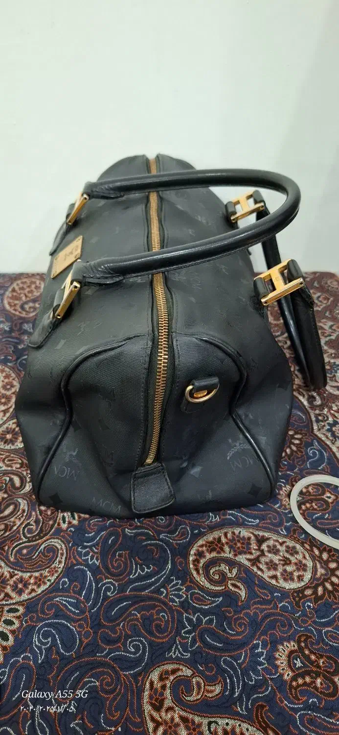 کیف|کیف، کفش، کمربند|مسجد سلیمان, |دیوار