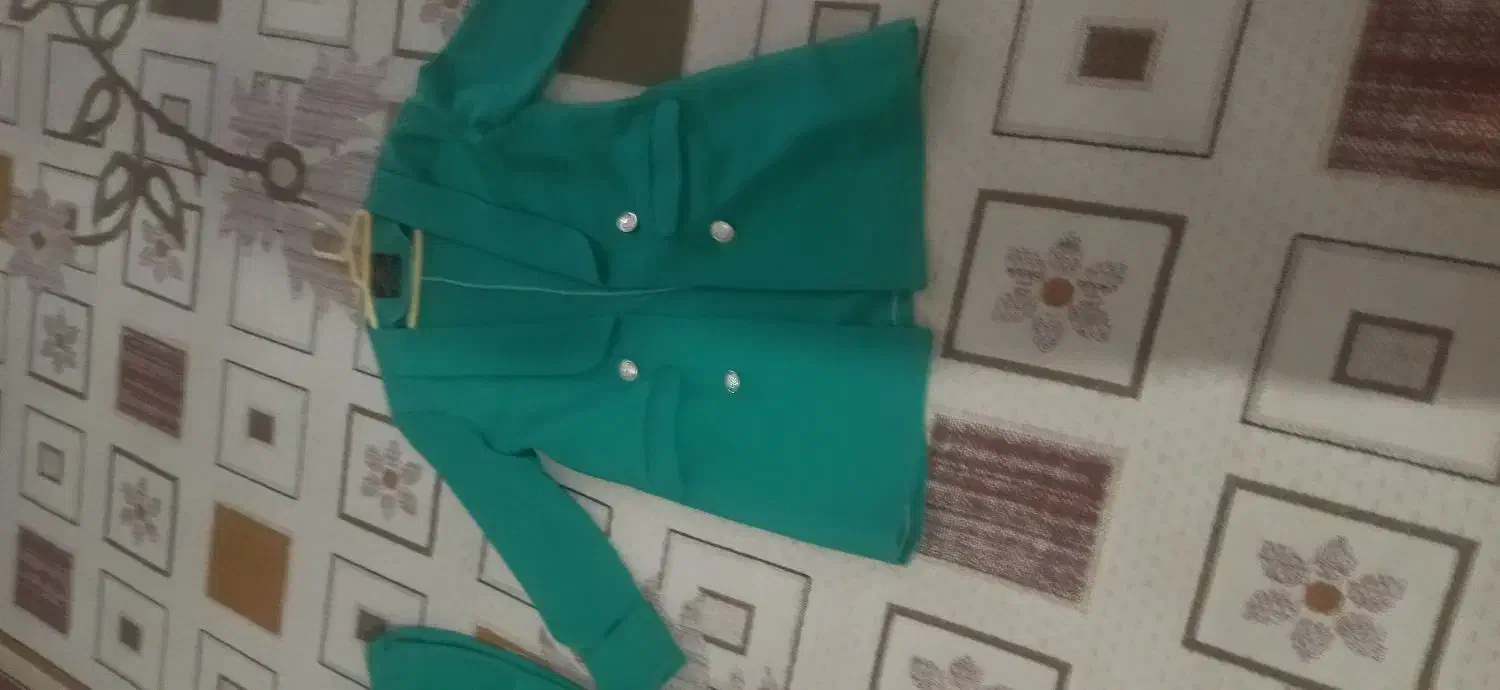 لباس تمیز|لباس|قم, باغ شریفی|دیوار