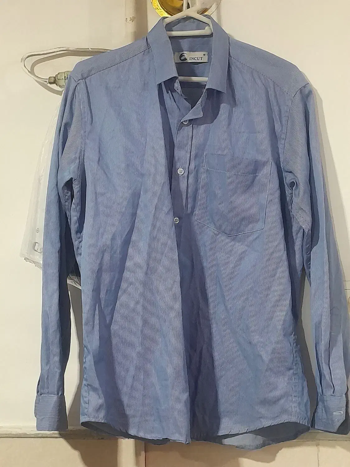 پیراهن مردانه|لباس|قم, دروازه ری|دیوار