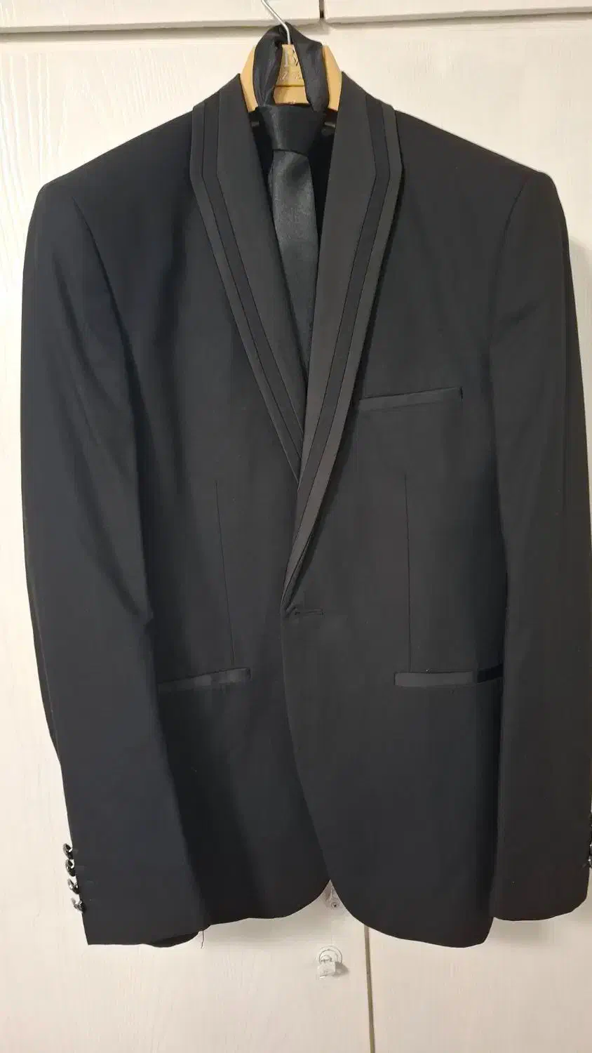 کت وشلوار|لباس|قدس, شهرقدس|دیوار