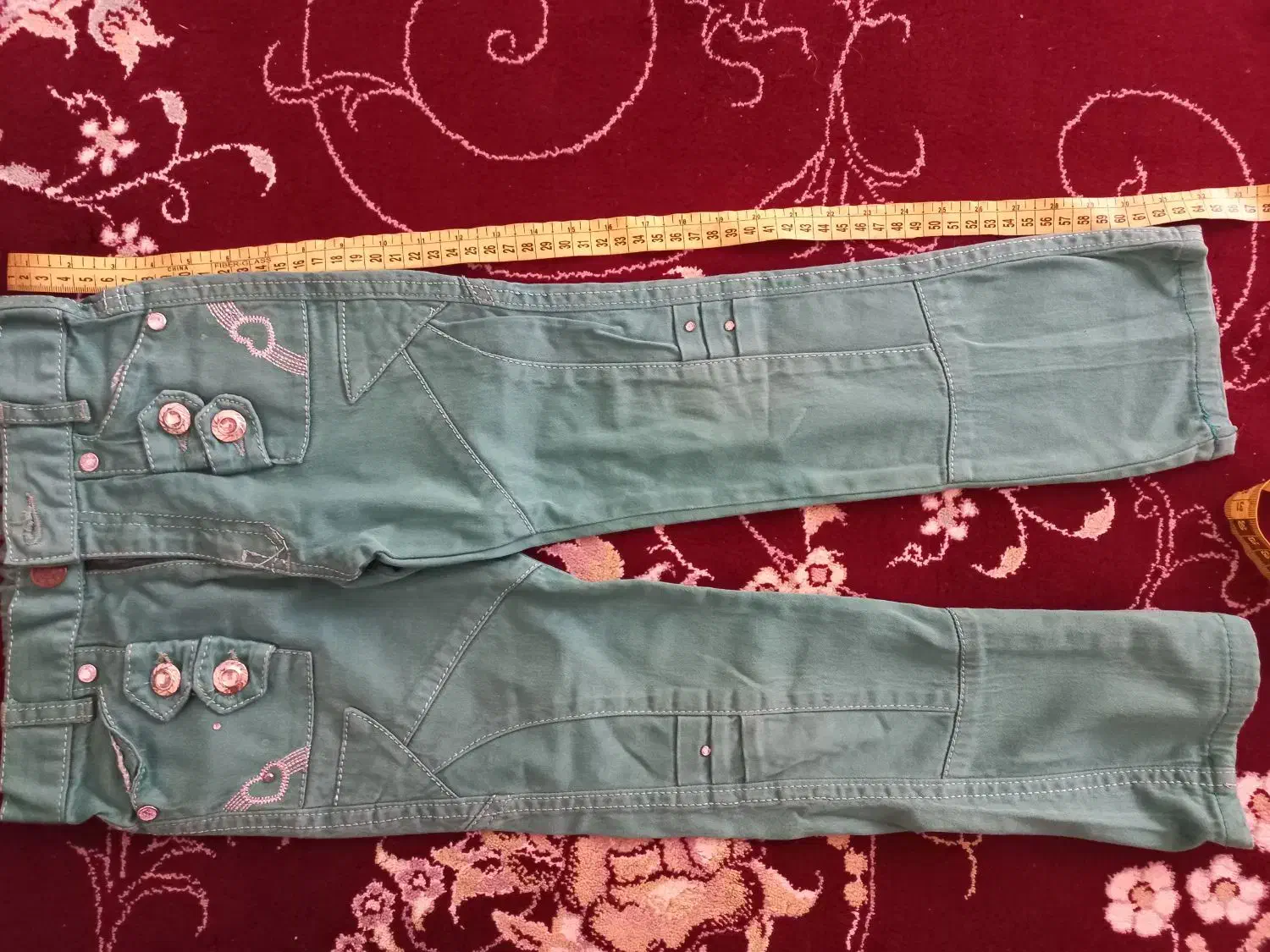 شلوارلی|لباس|قم, وادی السلام|دیوار