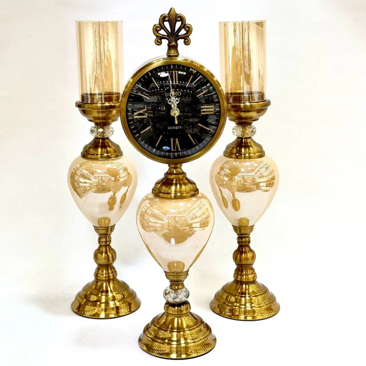 فروش تک و عمده ساعت و شمعدان به قیمت عمده|ساعت دیواری و تزئینی|تهران, شوش (باغ آذری)|دیوار