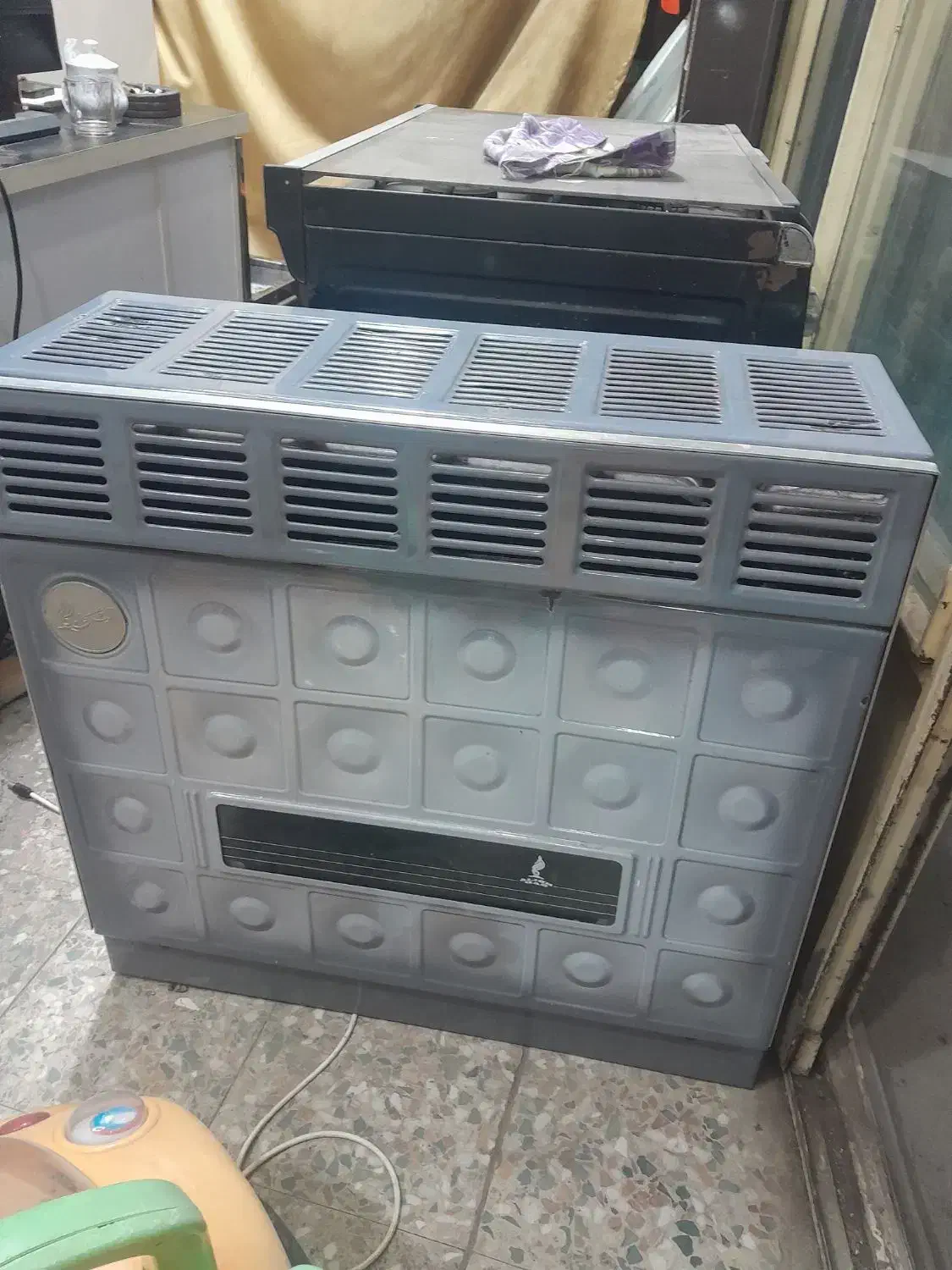 بخاری جان سوز|بخاری، هیتر، شومینه|رشت, نخودچر|دیوار