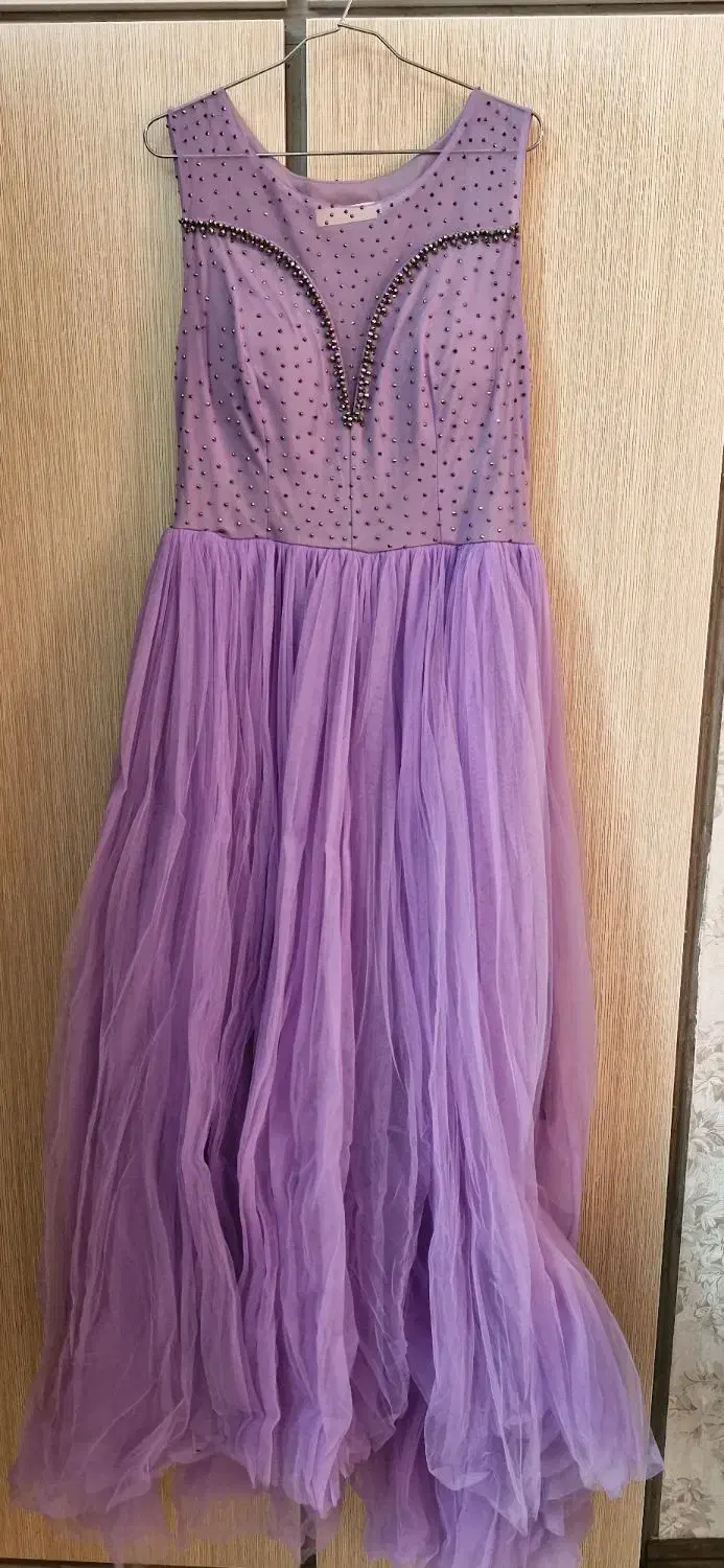 لباس مجلسی|لباس|مشهد, فتح المبین|دیوار