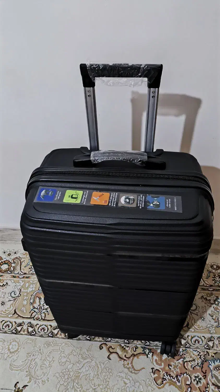 چمدان مسافرتی آکبند|کیف، کفش، کمربند|رشت, منظریه|دیوار