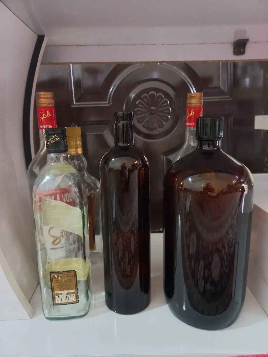 بطری خالی|ظروف نگهدارنده، پلاستیکی، یک‌بارمصرف|مسجد سلیمان, |دیوار