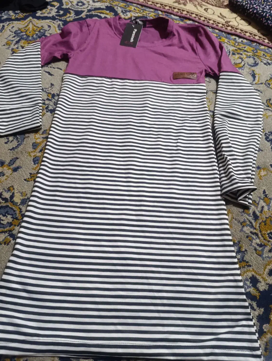 مانتووتونیک|کفش و لباس بچه|اهواز, کوی طلاب|دیوار