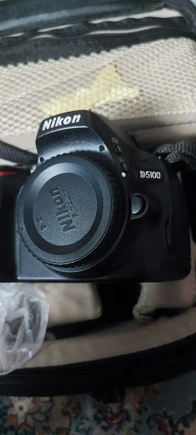 نیکون Nikon D5100 در حد نو + لنز + باتری اضافه|دوربین عکاسی و فیلم‌برداری|شیراز, شاهچراغ|دیوار