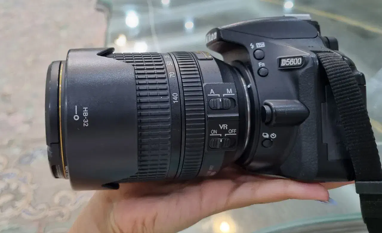فروش فوری دوربین عکاسی نیکون 5600D+پایه+فلش دوربین|دوربین عکاسی و فیلمبرداری|تهران, شهرک شریفی|دیوار