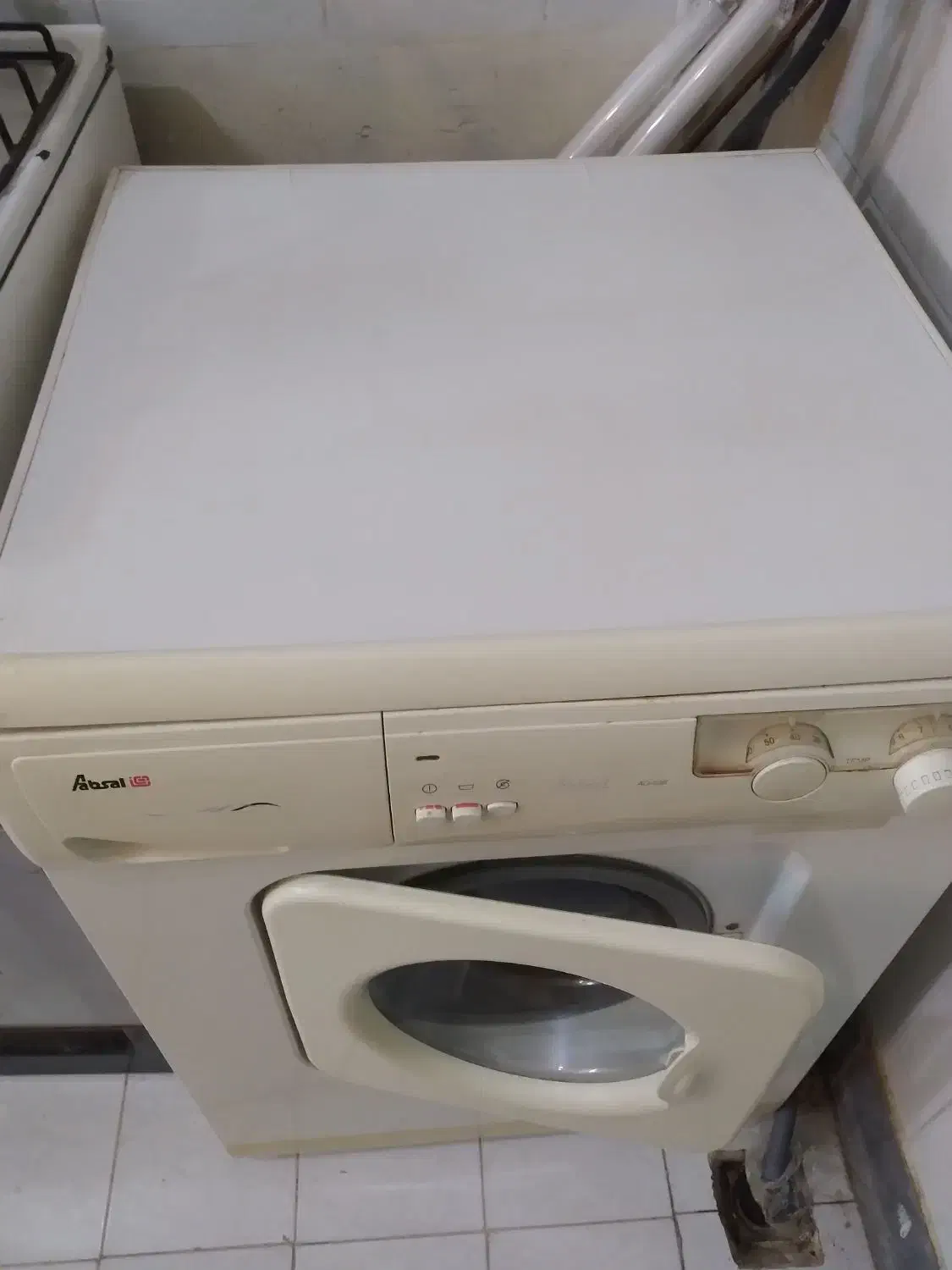 لباسشویی|ماشین لباسشویی و خشک‌کن لباس|قم, انسجام|دیوار