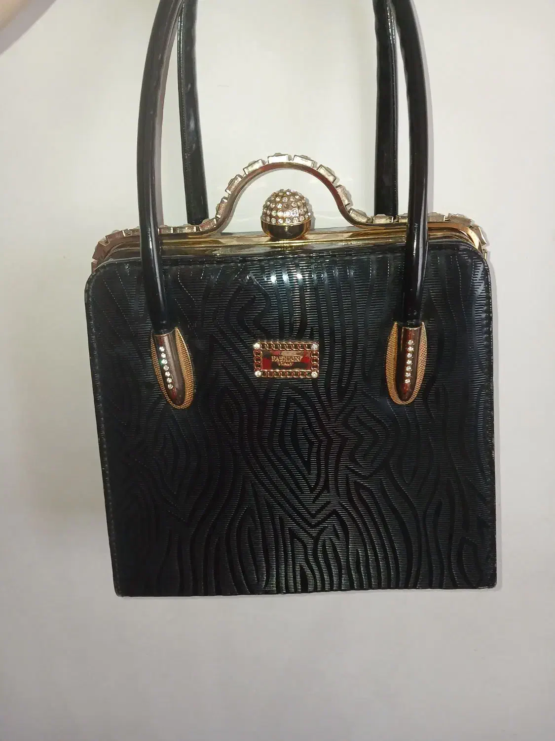 کیف|کیف، کفش، کمربند|رشت, لاکان|دیوار