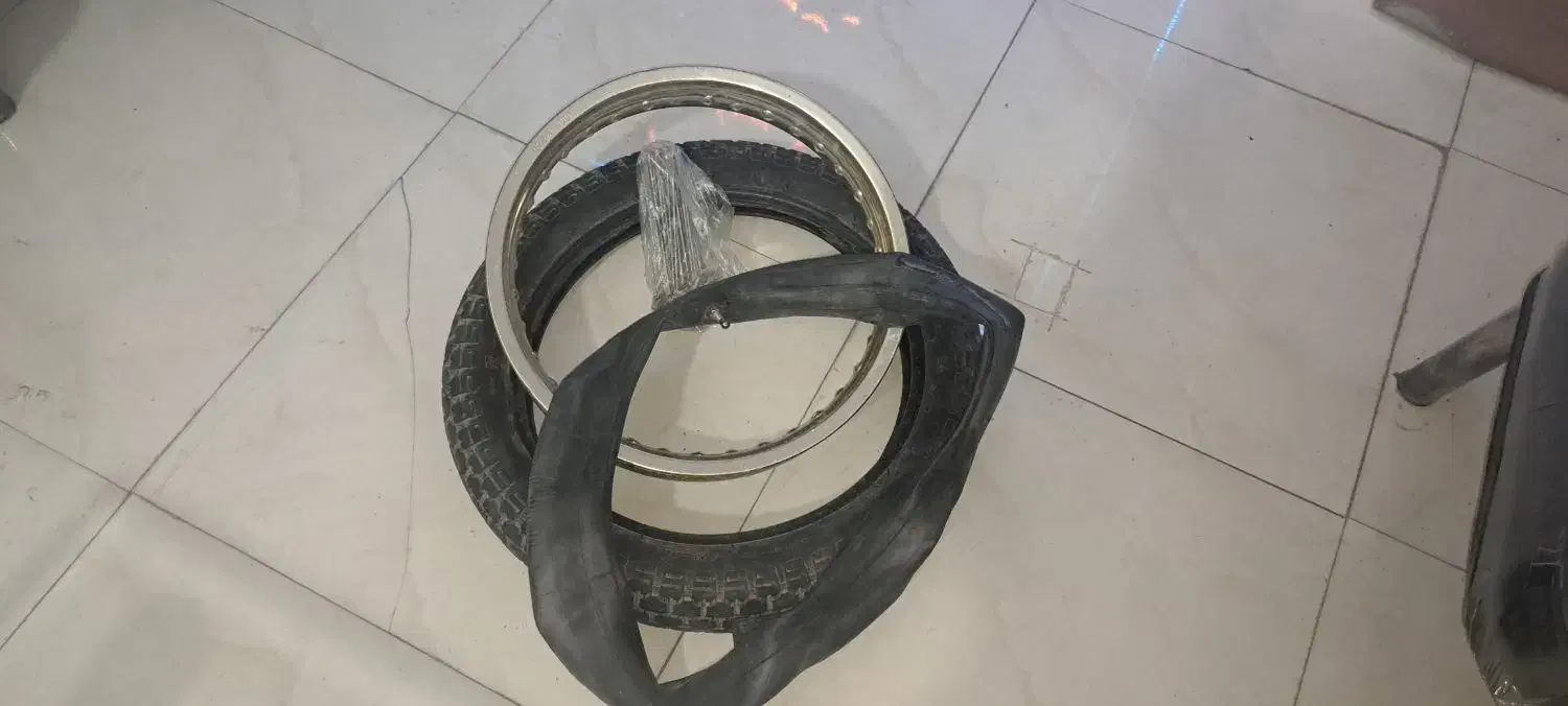 طوقه ۱۷ تریل با تیوب لاستیک پره کامل|قطعات یدکی و لوازم جانبی|هشتگرد, گلسار|دیوار