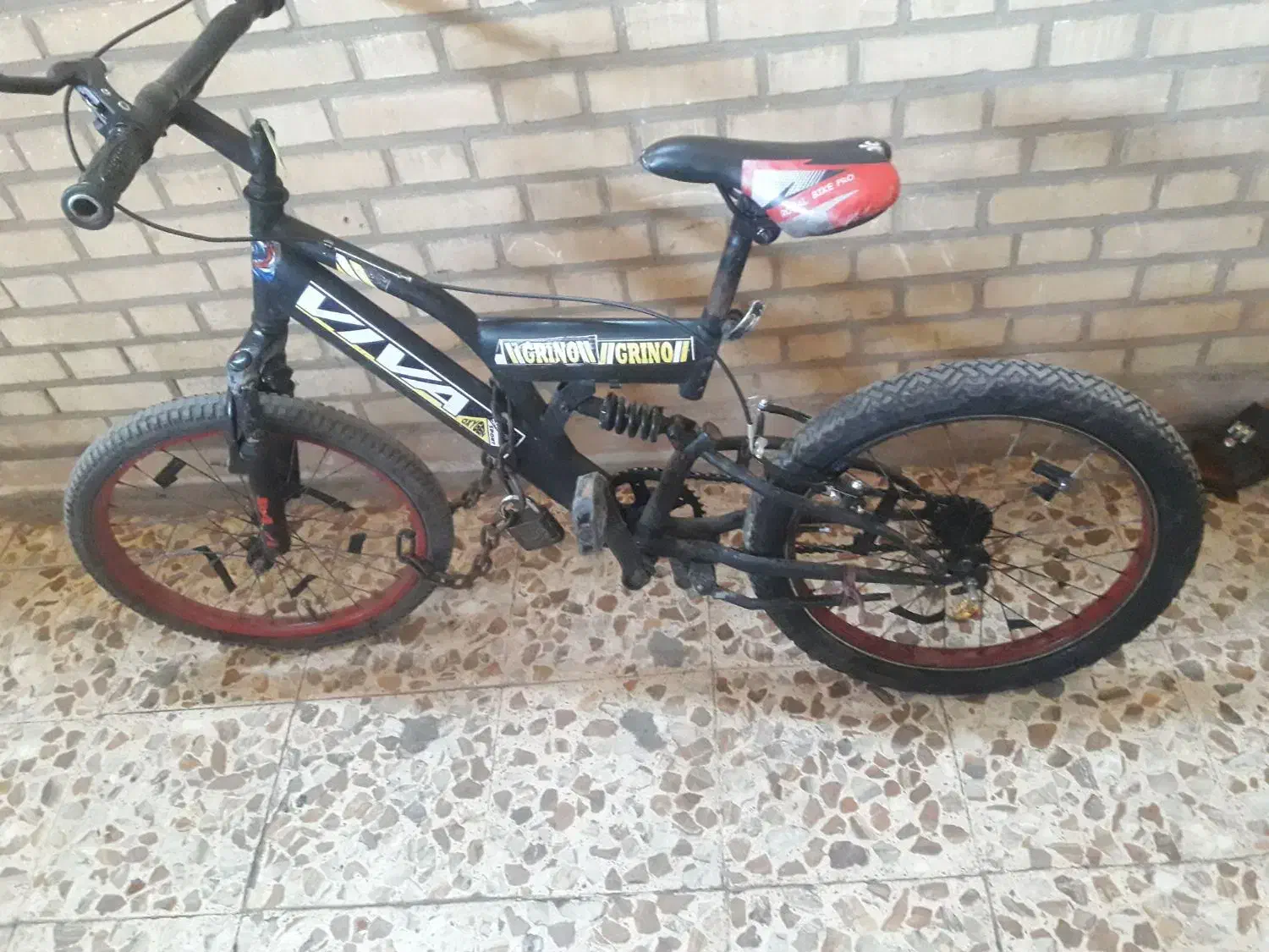 یک دوچرخه کمک دار|دوچرخه، اسکیت، اسکوتر|اهواز, منبع اب|دیوار