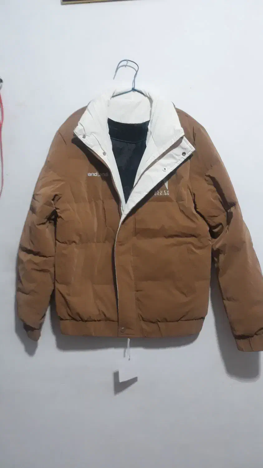 کاپشن|لباس|قم, شهرک امام حسن|دیوار