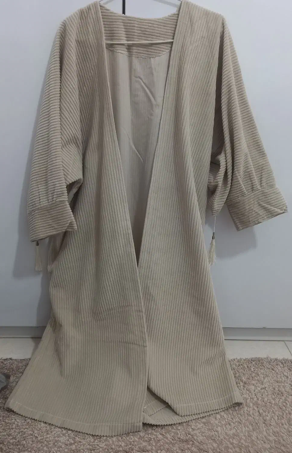 کاپشن|لباس|کرمانشاه, |دیوار