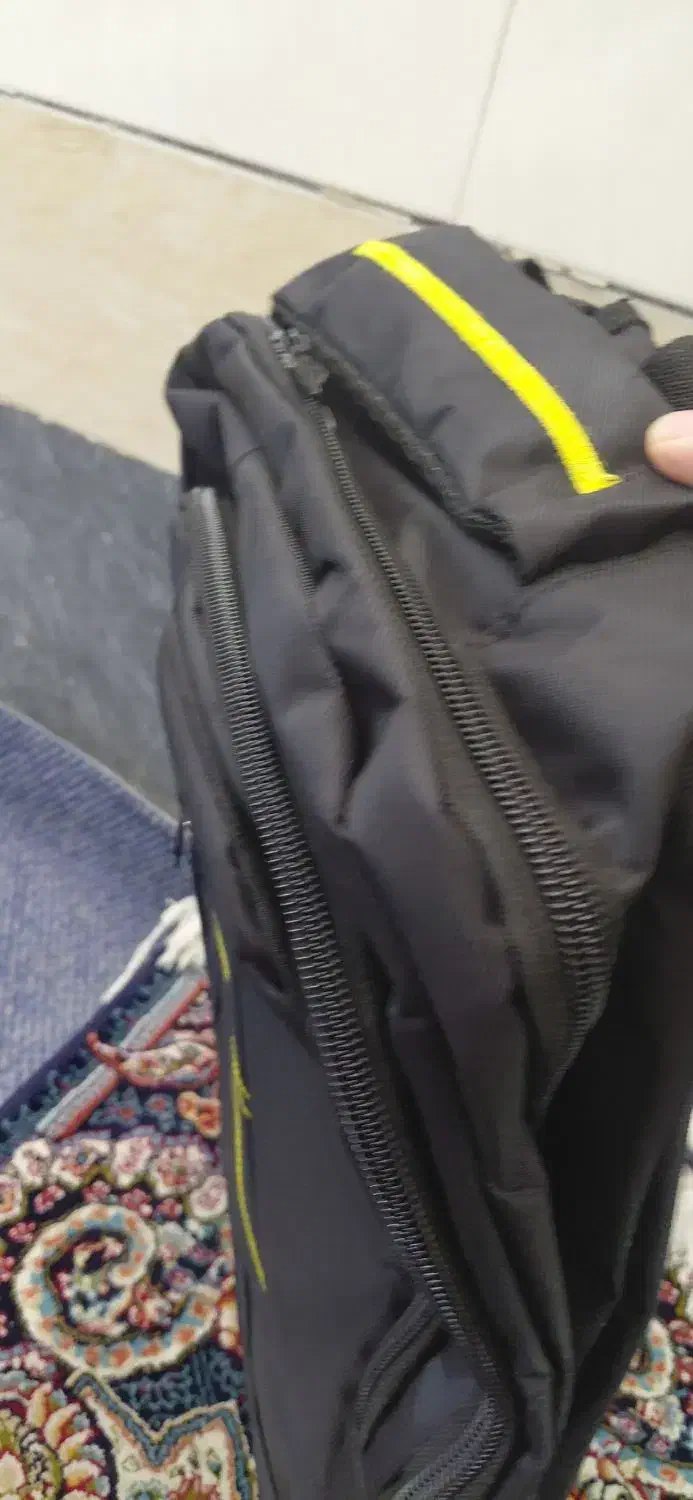 کیف مدرسه نو|کیف، کفش، کمربند|قم, وادی السلام|دیوار