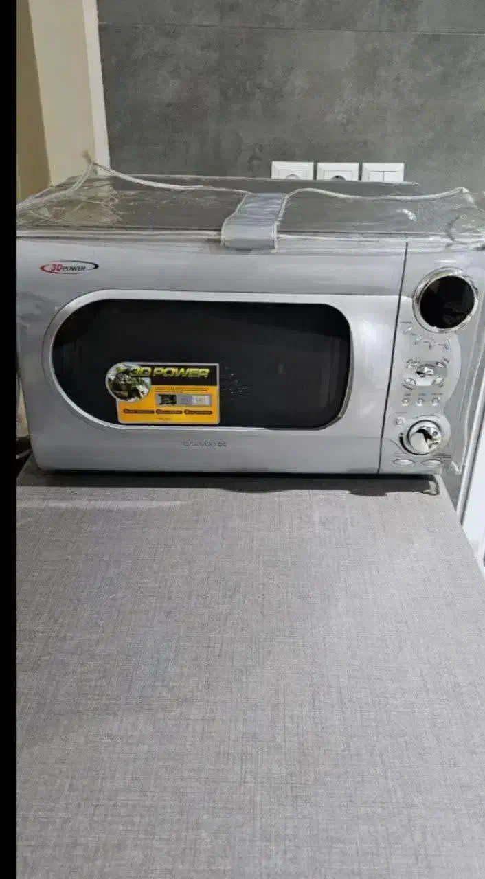 ماکروفر دوو اصل کره. پلوپز۶۰کاره دسینی|اجاق گاز و لوازم برقی پخت‌وپز|طرقبه, |دیوار